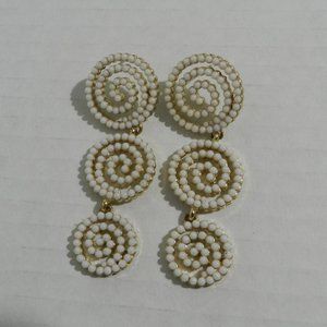 Swirled circle beaded triple drop earrings, white and gold with post backs
